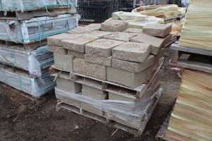 lot 246 image: Lot of (48) Tan Concrete retaining wall remnants 13x12x4in., 18x12x8in.