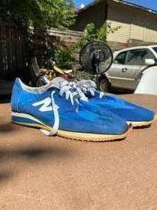 lot 73 image: New Balance Blue Tennis shoes
