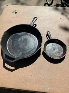 lot 74 image: Two cast iron skillets