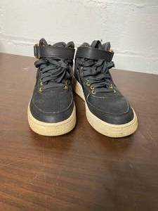 lot 94 image: Black Nike Air Force 1s