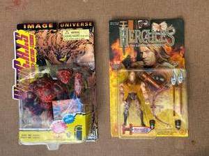 lot 336 image: Lot of Two Action Figures ( Hercules and Wild C.A.T.S) New in Box