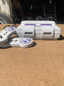 lot 358 image: Super Nintendo Gaming System with Two Controllers