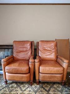 lot 1 image: Two Brown Hooker Leather Reclining Chairs With Ornate Woodworking
