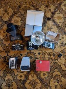 lot 31 image: Vintage Cameras featuring Pentax ME, Kodak Dual Reflex, Box Camera & More