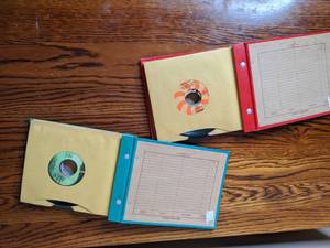 lot 34 image: Lot of Two Books of Records- 45s-