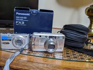 lot 195 image: Panasonic FX3 and a Canon Z180U Sure shot. Untested. with cords and a carry bag for the cannon