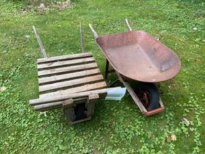 lot 146 image: Wood plank and metal wheelbarrows