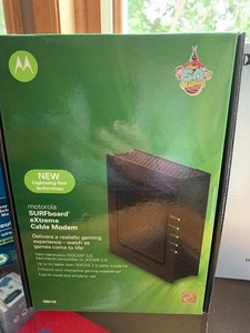 lot 17 image: Two Routers and  Modem