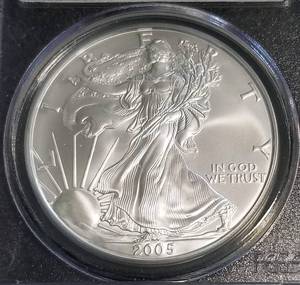 lot 08 image: 2005 AMERICAN SILVER EAGLE 1 TROY OZ. .999 FINE SILVER GEM UNC PCGS