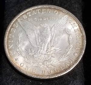 lot 31 image: 1883-O MORGAN SILVER DOLLAR BU nice edge toning
