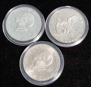 lot 35 image: GROUP OF 3 EISENHOWER DOLLARS IN AIRTITES 2-PROOFS 1-UNC