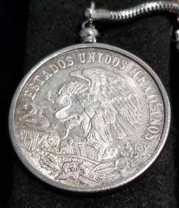 lot 39 image: 1968 MEXICO 25 PESO 72% SILVER OLYMPIC (silver dollar size) on keychain