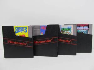 lot 28 image: 4 Nintendo NES Video Games