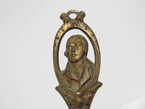 lot 208 image: Antique Bronze Robert Burns Fireplace Poker Fork Tool