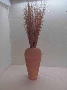 vase ,grass stems