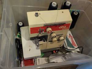 lot 556 image: SERGER SEWING MACHINE TO FINISH OFF ALL THAT SEWING