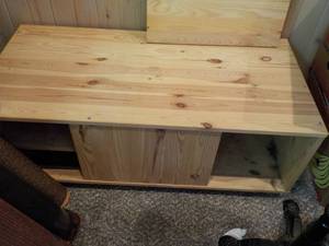 lot 571 image: WOOD COFFEE TABLE ON CASTER WHEELS