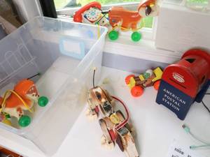 lot 156 image: VINTAGE FISHER PRICE PULLS  COWS, DOGS AND AIRPLANES OH MY