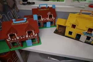 lot 164 image: VINTAGE FISHER PRICE TUDOR, PLAY FAMILY HOME and SESAME STREET
