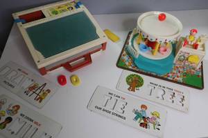 lot 165 image: VINTAGE FISHER PRICE SCHOOL DESK AND MERRY GO ROUND