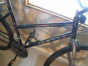 lot 915 image: Huffy Santa Fe Bike With Storage Ra...