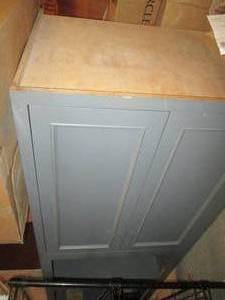 lot 924 image: Wood Cabinet 27 X 33 X 108 With ...