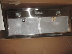 lot 940 image: Presenza Range Hood Dented See Ph...
