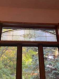 lot 444 image: DECORATIVE GLASS WINDOW INSET