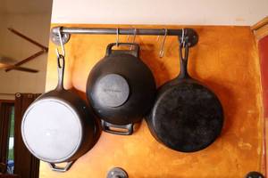 lot 426 image: 3 CAST IRON PANS