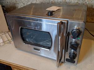 lot 404 image: WOLFGANG PUCK PRESSURE COOKER OVEN
