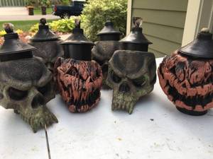 lot 183 image: Six Halloween Tiki Light Decorations With Two Full Bottles Of Fuel