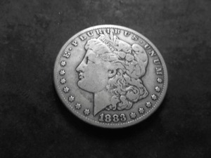 lot 11 image: 1883 CC Morgan Silver Dollar