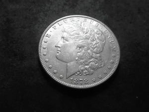 lot 12 image: 1878 7 Over 8 Tail Feathers  Morgan Silver Dollar (Double Die)