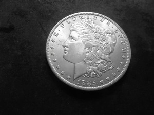 lot 18 image: 1885 O Morgan Silver Dollar