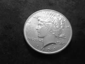 lot 53 image: 1924 Peace Silver Dollar