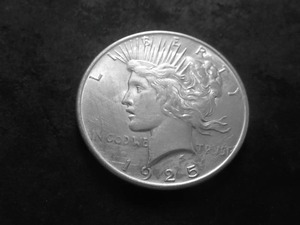lot 55 image: 1925 Peace Silver Dollar