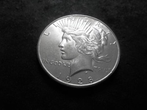 lot 63 image: 1928 S Silver Peace Dollar