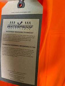 lot 20 image: MossyOak Blaze Orange Coveralls