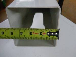 lot 90 image: White Vynil 6x6x108 Post Cover Knotched for railing.-Not used