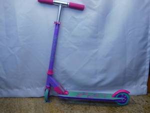 lot 57 image: MADD GEAR CARVE 100 Purple Pink Teal - Folding Aluminum Kick Scooter - Suits Girls Ages 3 - Max Rider Weight 146lbs - 3, Retails $19.97-Not used