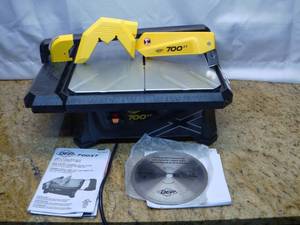 lot 34 image: 700xt, Wet Tile Saw-Good Condition