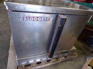 lot 94 image: Commercial Oven with legs NG Consignor states works