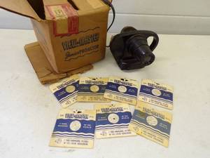 lot 23 image: Vintage View Master with 7 Slides