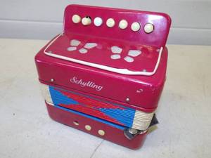 lot 149 image: Vintage Schylling Accordion
