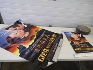lot 154 image: Pair of Gone With The Wind Movie Posters and Film Canister