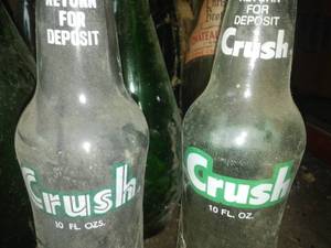2 Crush bottles, 4 Nesbitts glass bottles & caps wood crate & more