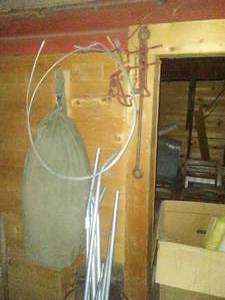 Wall of 5 feet, tent poles ,3 metal cans, misc. hardware Lots going on