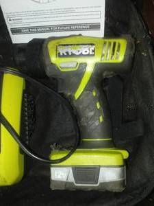 Ryobi 12 volt drill, battery, charger, and case