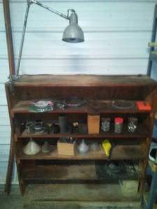 Shelving unit 4 x 4 x 1 with contents with clamp on work lite