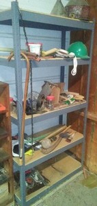 Metal Shelving unit with contents.